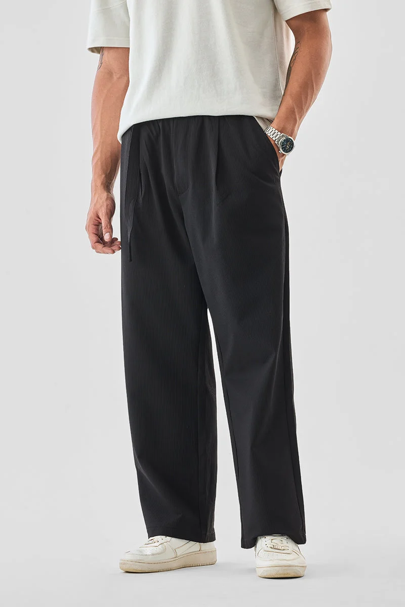 SNITCH بنطلون مطاطي بنقوش