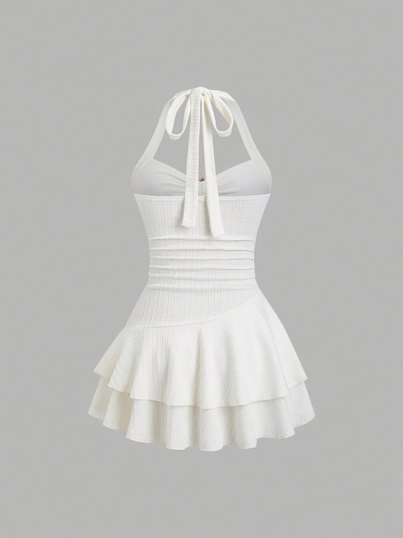 New Women'S Spring And Summer Dress Suitable for Beach Vacations, Featuring Elegant Textured Fabric, a Front Pleated Design with Metallic Embellishments, And Playful Layered Ruffles at Th... - Image 2