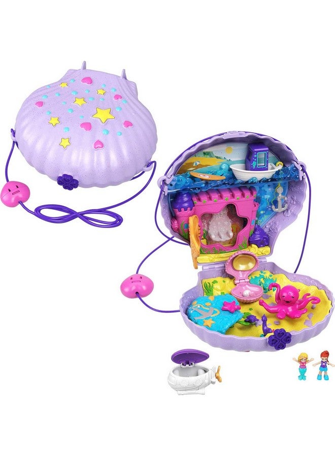 Polly Pocket Polly Pocket Tiny Power Seashell Purse Compact with Wearable Strap, Fun Under-The-Sea Features, Micro Polly and Lila Mermaid Dolls, 2 Accessories & Sticker Sheet; for Ages 4 Years Old & Up  - Image 1