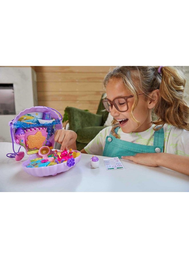 Polly Pocket Polly Pocket Tiny Power Seashell Purse Compact with Wearable Strap, Fun Under-The-Sea Features, Micro Polly and Lila Mermaid Dolls, 2 Accessories & Sticker Sheet; for Ages 4 Years Old & Up  - Image 3