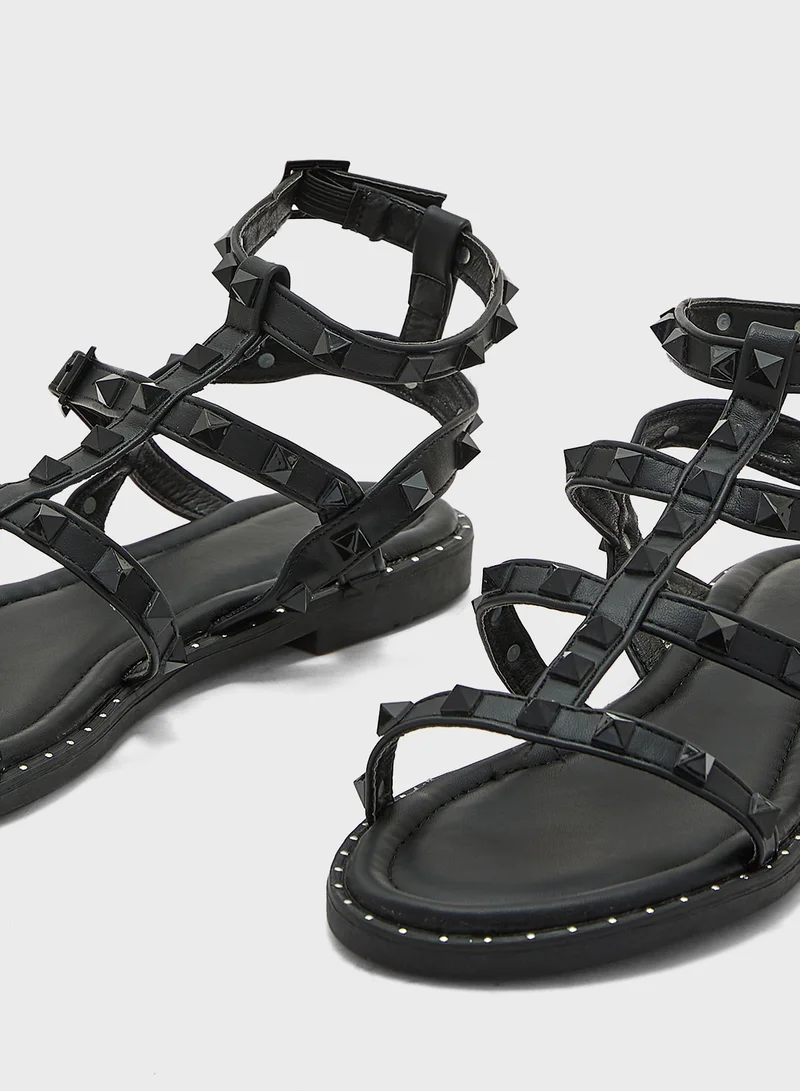ترافل من نمشي Multi Strap Ankle Strap Stud Sandal