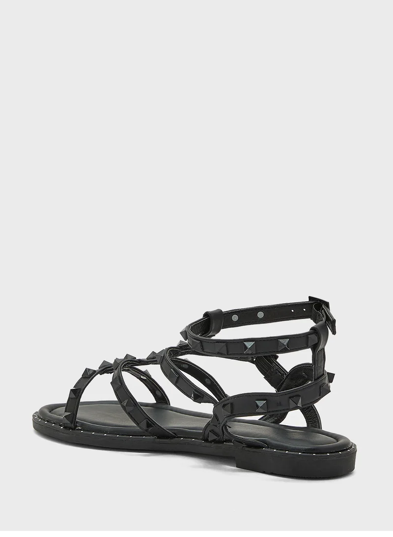 ترافل من نمشي Multi Strap Ankle Strap Stud Sandal