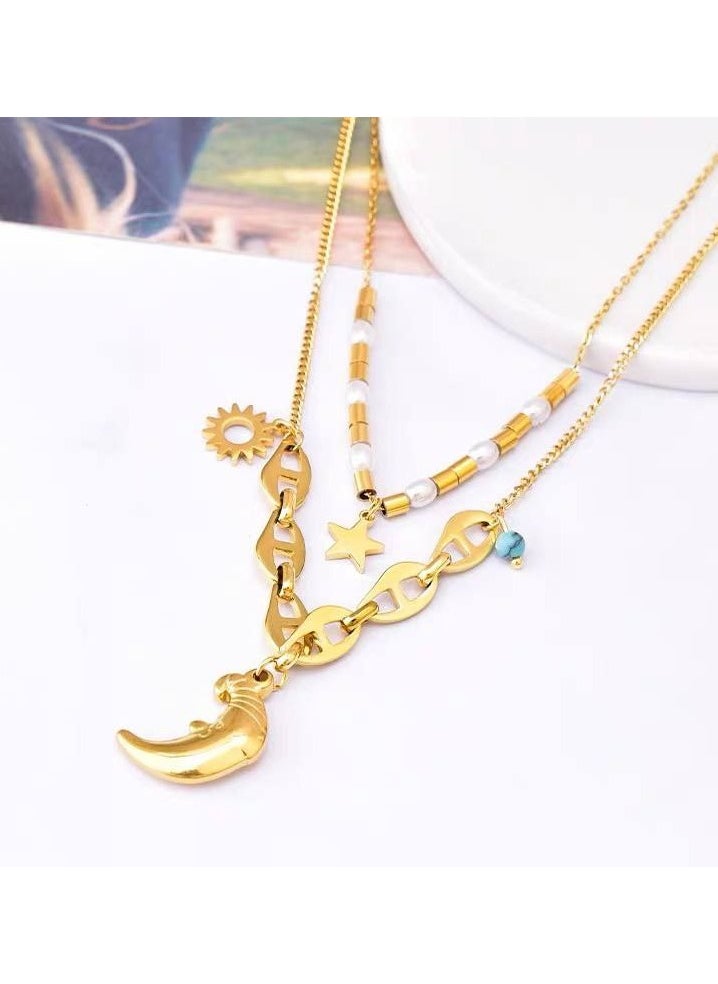 The Black Pearl Accessories - Stainless Steel Gold Necklace with Moon and Stars Pendant - Image 1
