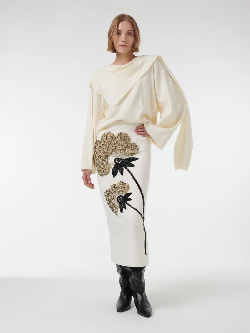 ليم كنزة مُحاكة بياقة على شكل وشاح