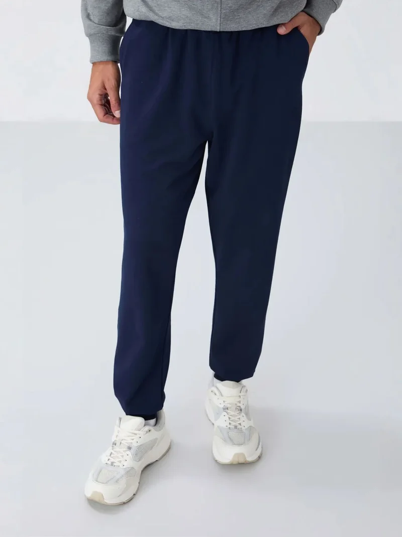 تومي لايف TOMMY Men's Solid Fleece Sweatpants
