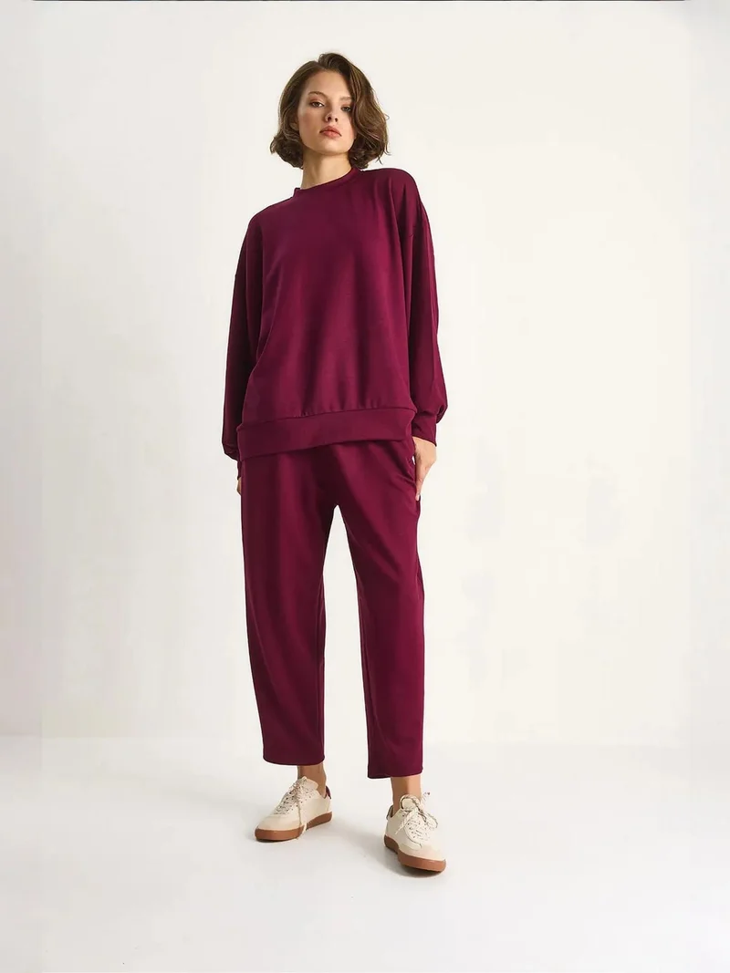 بيانكو لوتشي طقم محبوك من قطعتين بياقة مستديرة وأكمام طويلة