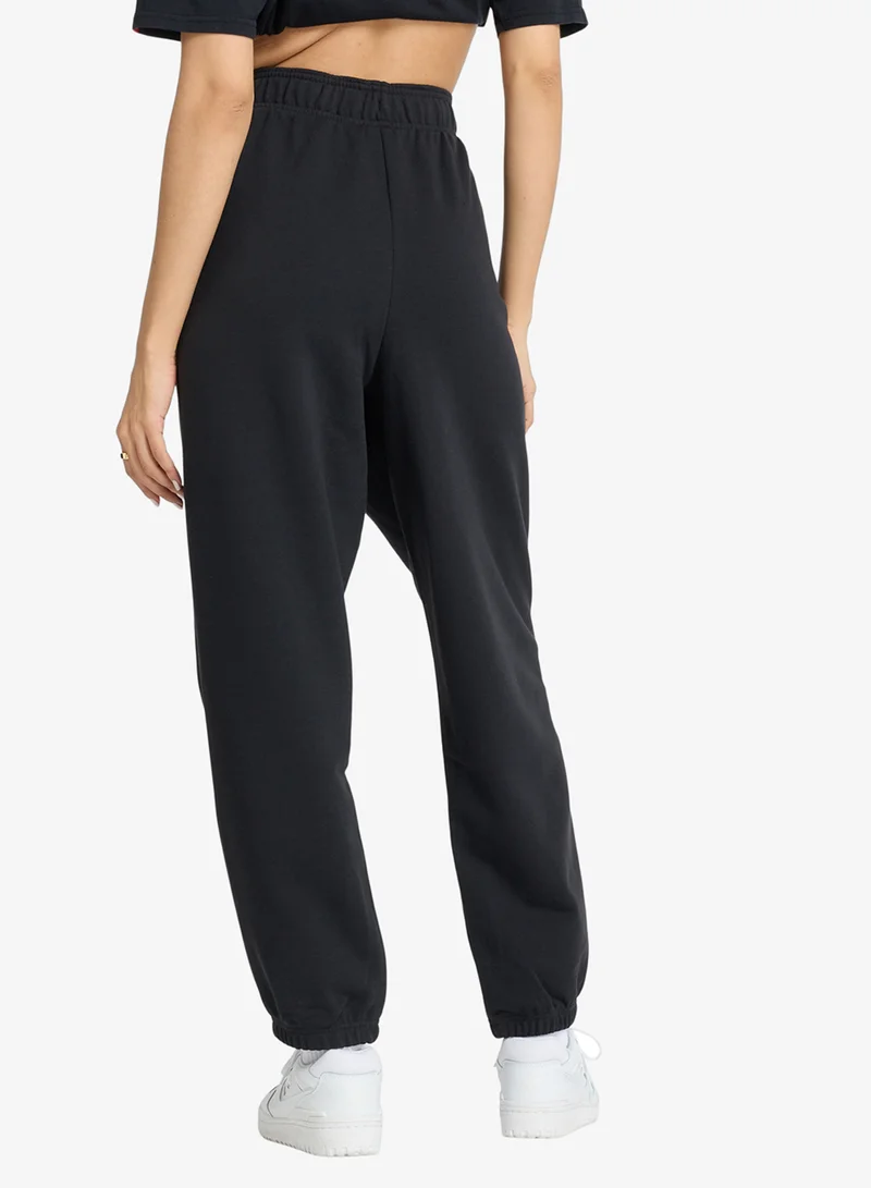 نيو بالانس سروال رياضي أساسي من نسيج تيري فرنسي