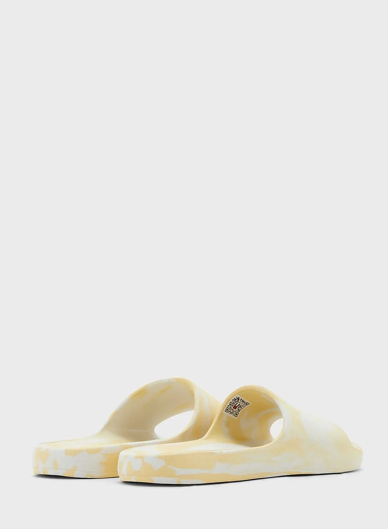 TOMMY JEANS One Strap Wave Slides