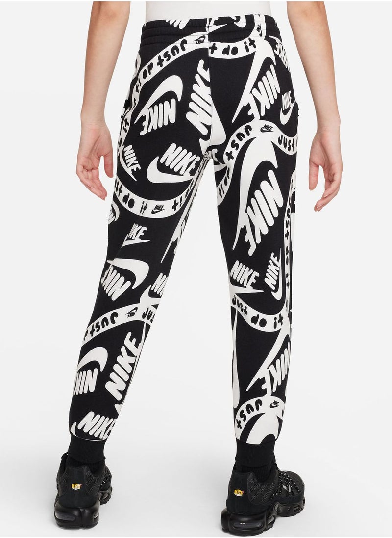 Nike - Kids Club Fleece All Over Printed Joggers - Image 1