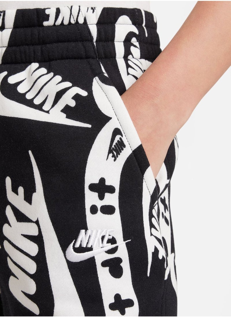 Nike - Kids Club Fleece All Over Printed Joggers - Image 1