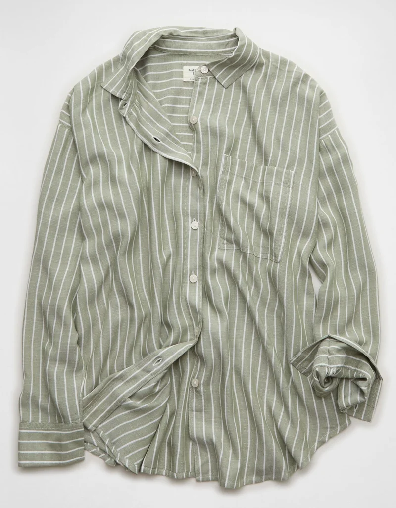 امريكان ايجل قميص فضفاض مزيّن بعبارة