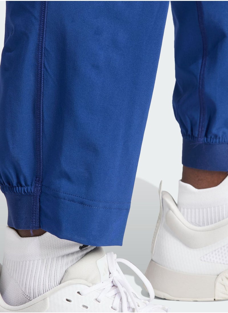 Adidas - Train Essential Woven Sweatpants - Image 1