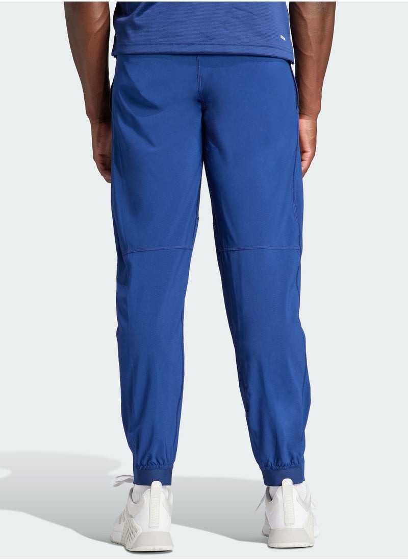 Adidas - Train Essential Woven Sweatpants - Image 1