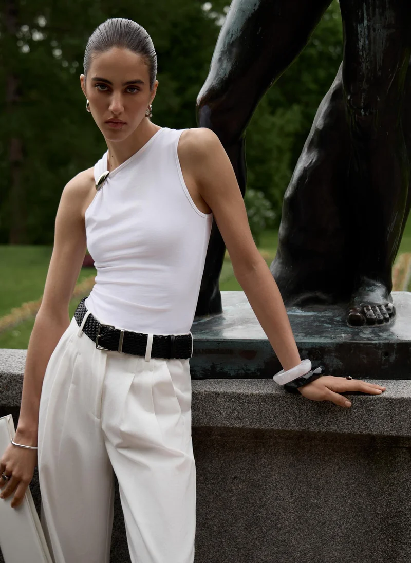 Lichi Top with asymmetrical straps and metal decorations