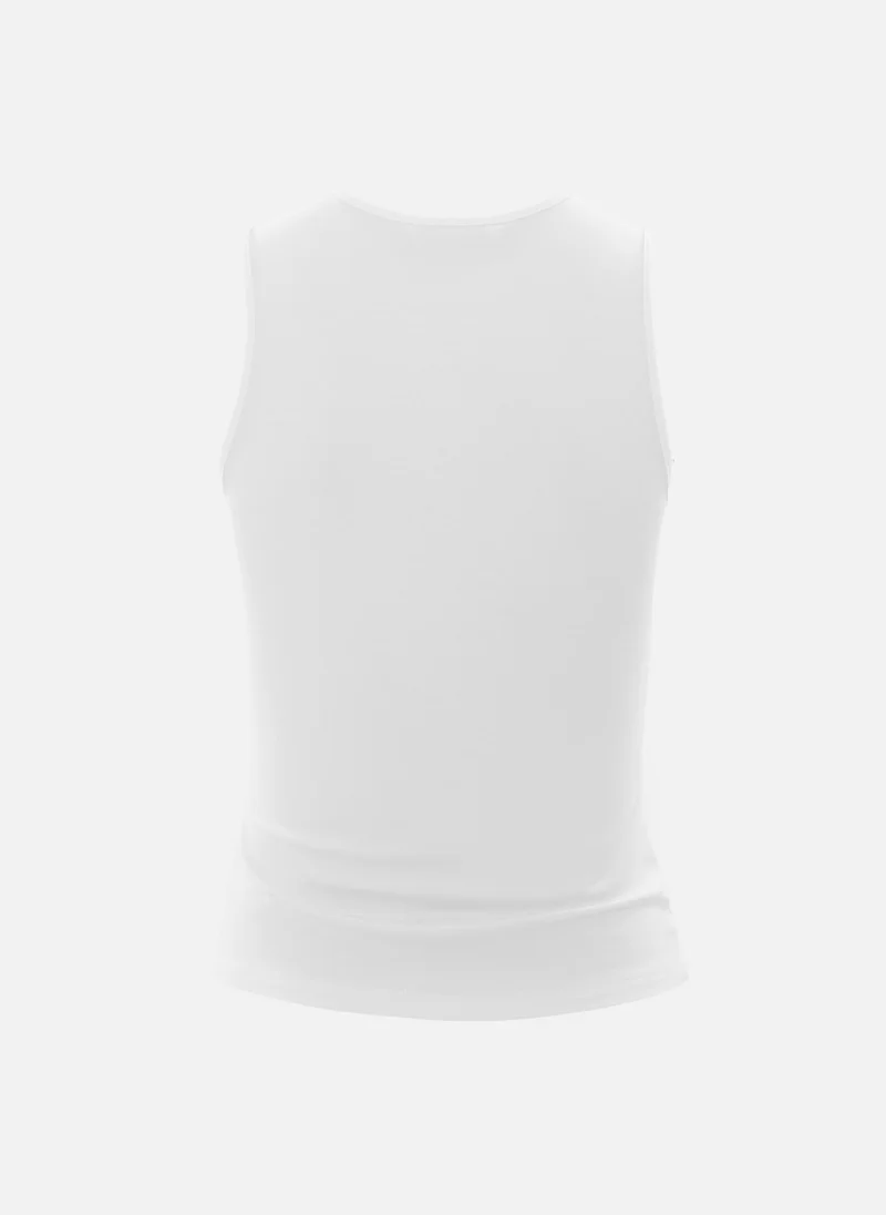 Lichi Top with asymmetrical straps and metal decorations