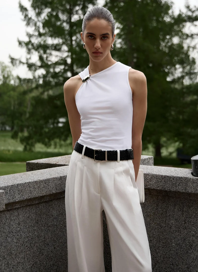Lichi Top with asymmetrical straps and metal decorations