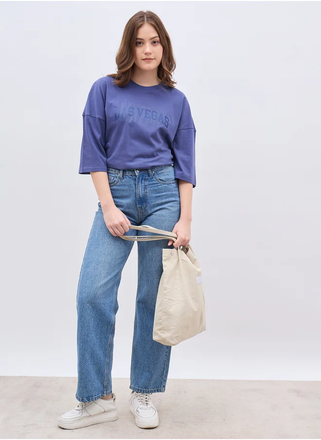 Styli Exaggerated Shoulder Slogan Print Oversized T-Shirt