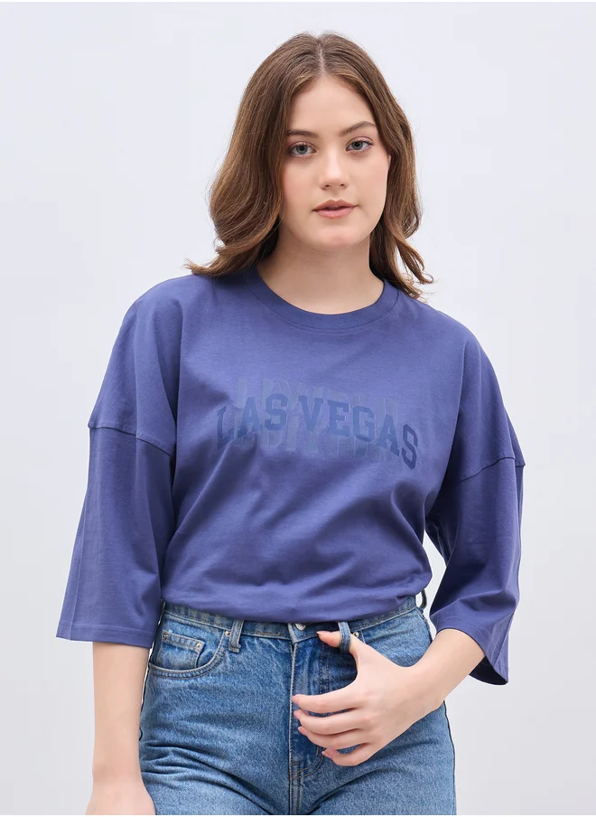 Styli Exaggerated Shoulder Slogan Print Oversized T-Shirt