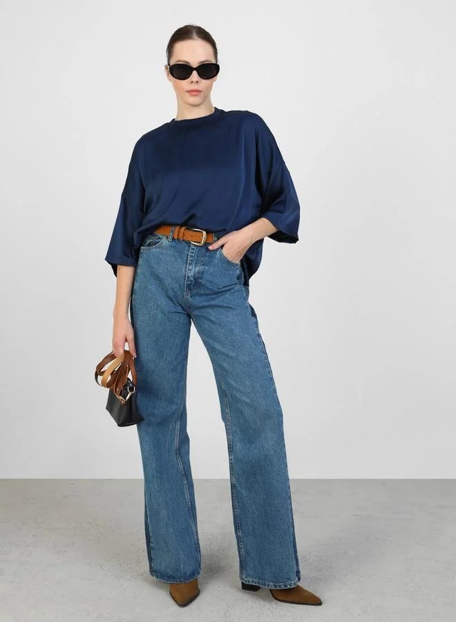 رفقة من مودانيسا رفقة من مودانيسا بلوزة سادة بأكمام خفاش لون أزرق داكن