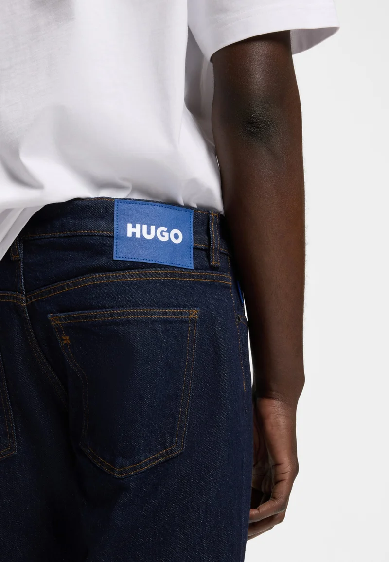 HUGO Dark Blue Tapered-fit jeans in dark-blue stretch denim for Men | Best Price UAE