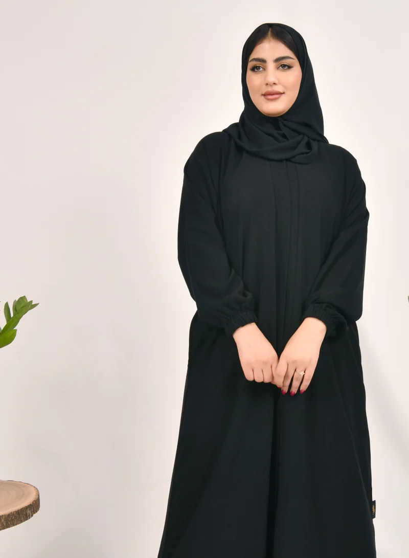 HAWRAA ABAYA Plain black abaya with snap closure, ruffled sleeves and hidden pockets