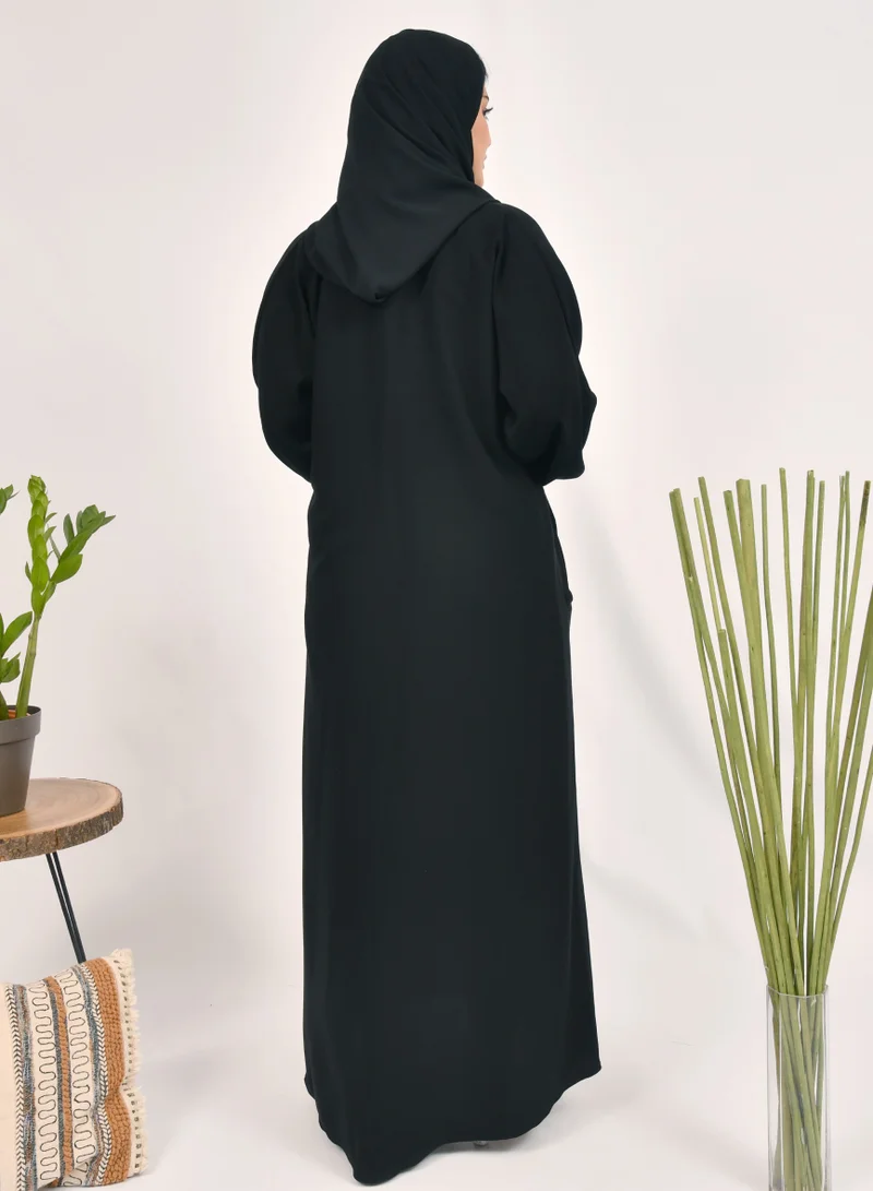 HAWRAA ABAYA Plain black abaya with snap closure, ruffled sleeves and hidden pockets