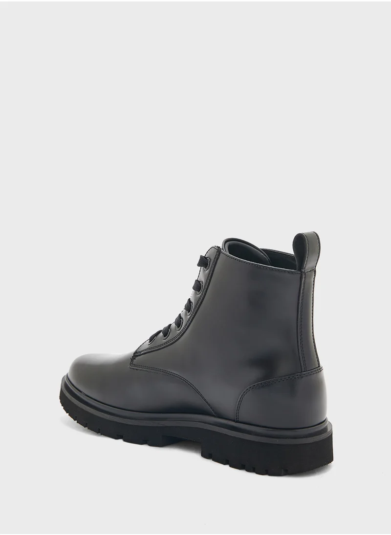 كالفن كلاين جينز EVA BOOT MID LACEUP MG LTH