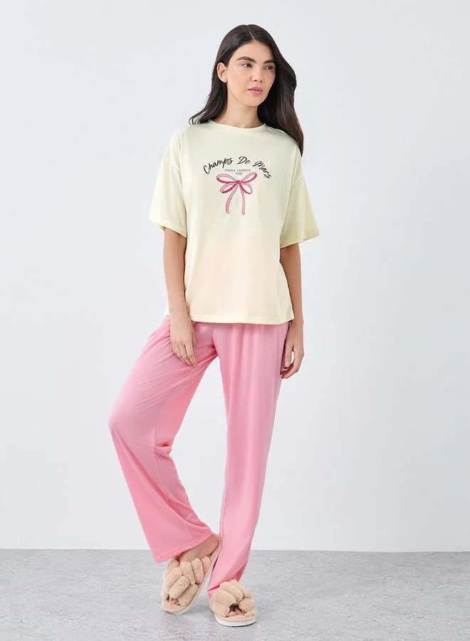 Styli Styli Paris Bow Graphic Drop Shoulder T-Shirt and Pyjama Set