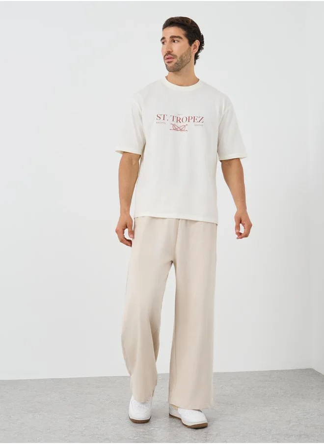Styli Styli Slogan Print Crew Neck Oversized T-Shirt