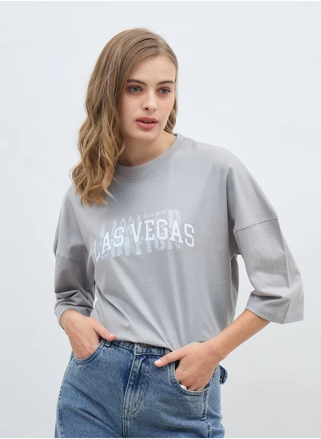 Styli Styli Exaggerated Shoulder Slogan Print Oversized T-Shirt
