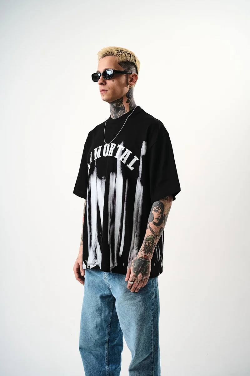 ريسباير تيشيرت رجالي واسع (Oversize) مطبوع بعبارة "İmmortal" لون أسود