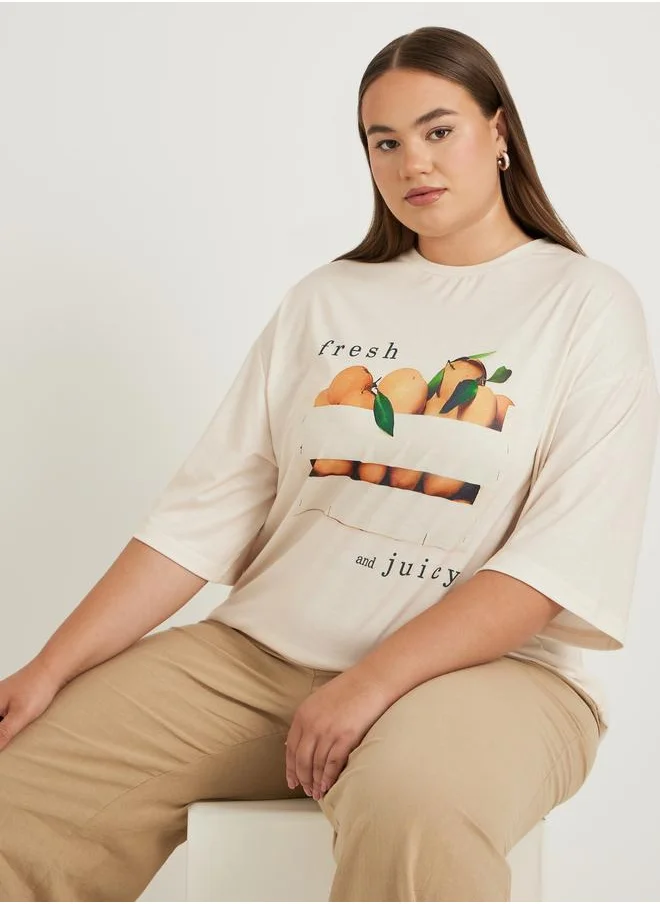 Styli Styli Plus Size Graphic Print Dropped Shoulder Oversized T-Shirt