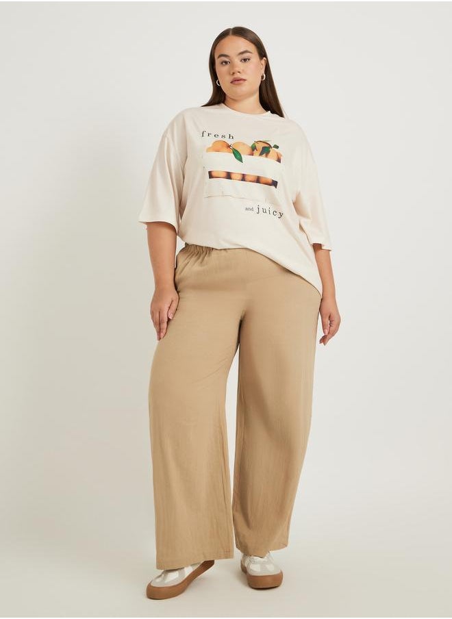 Styli Styli Plus Size Graphic Print Dropped Shoulder Oversized T-Shirt  - Image 3