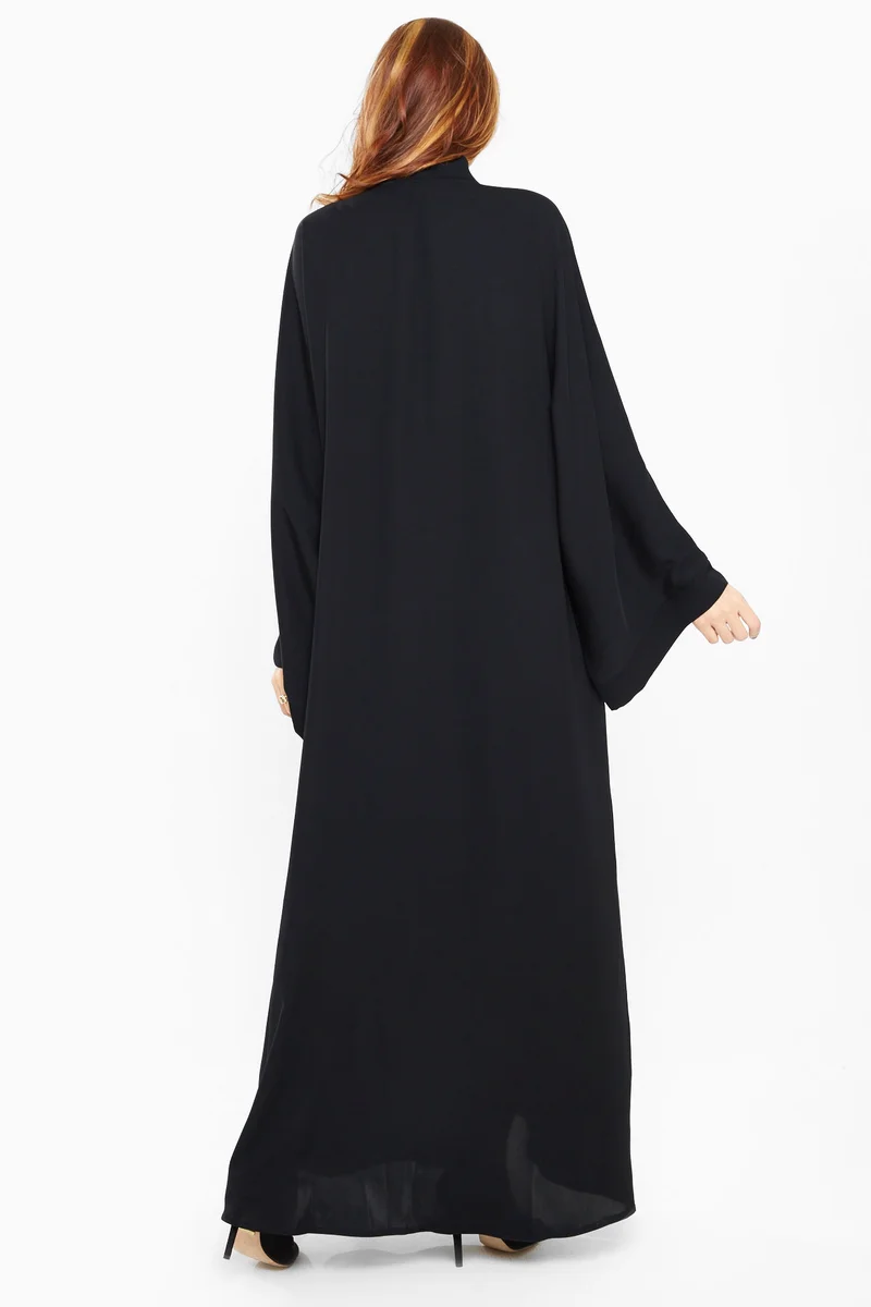 النخبة A sensuous black abaya with pearls on one half of the abaya and sleeves-AJ440A