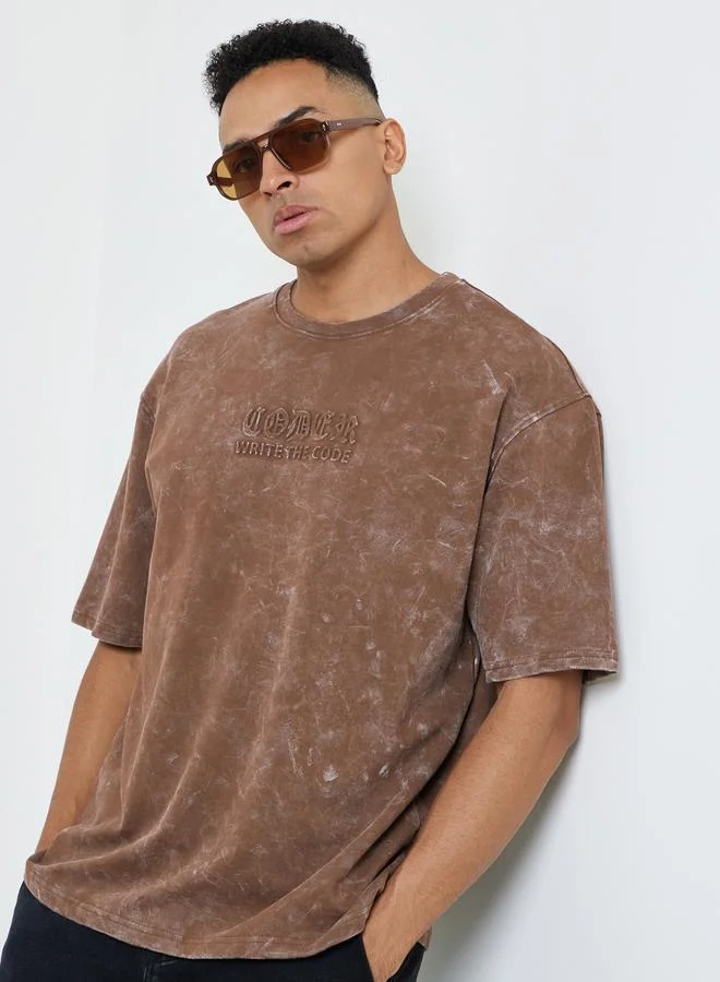 Styli Men Acid Wash Oversized Terry T-Shirt with Embossed Print