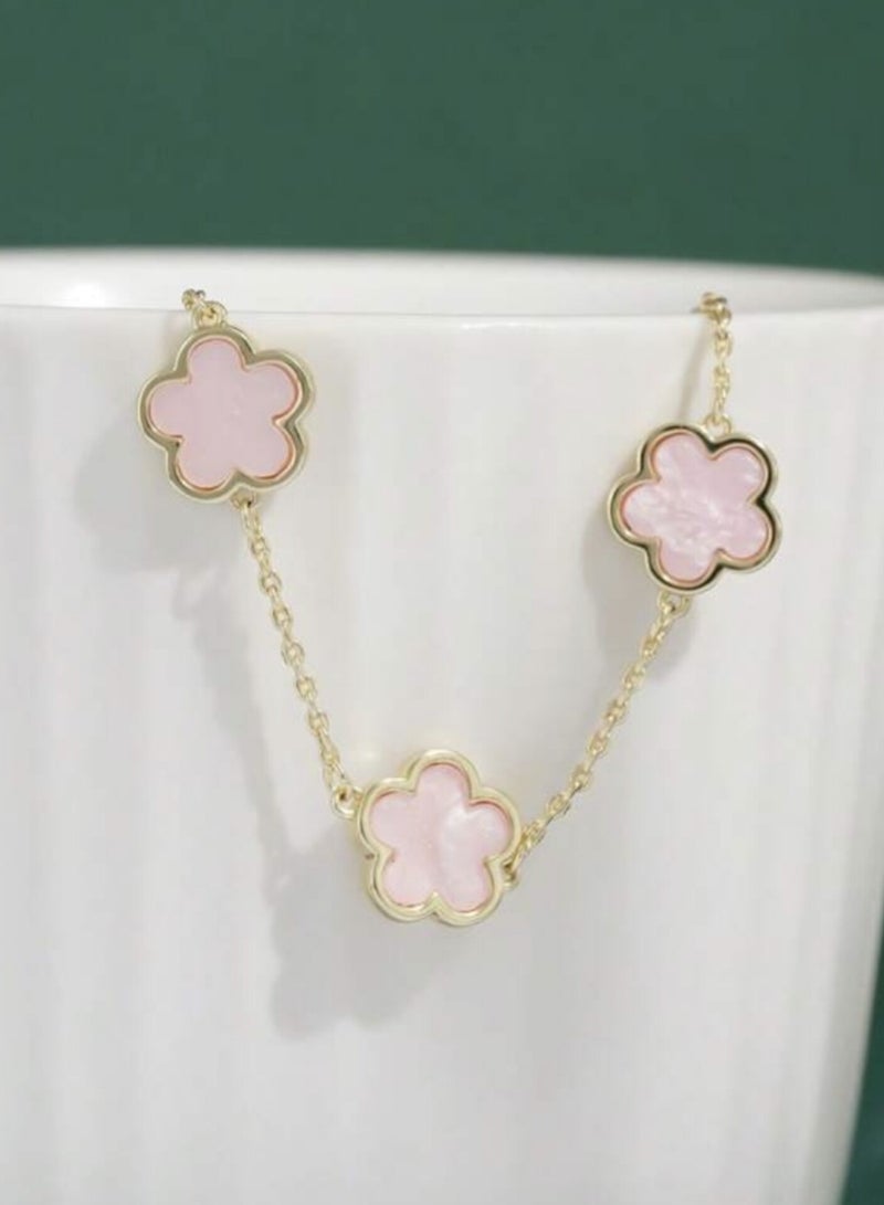 YUCCA Elegant Rose Bracelet in Gold with a Pink Interior - Image 2