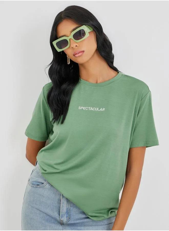 تايك تو Take Two Embroidered Slogan Oversized T-Shirt