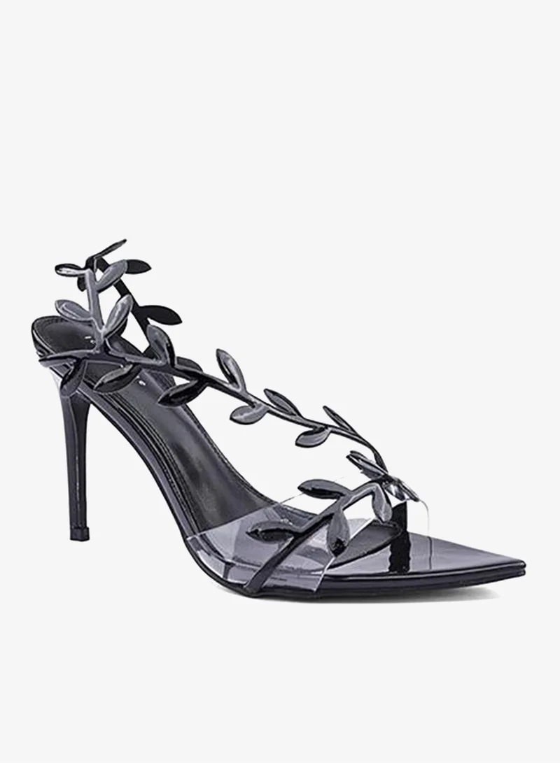 أيقون صنادل بكعب مزينة بأشرطة