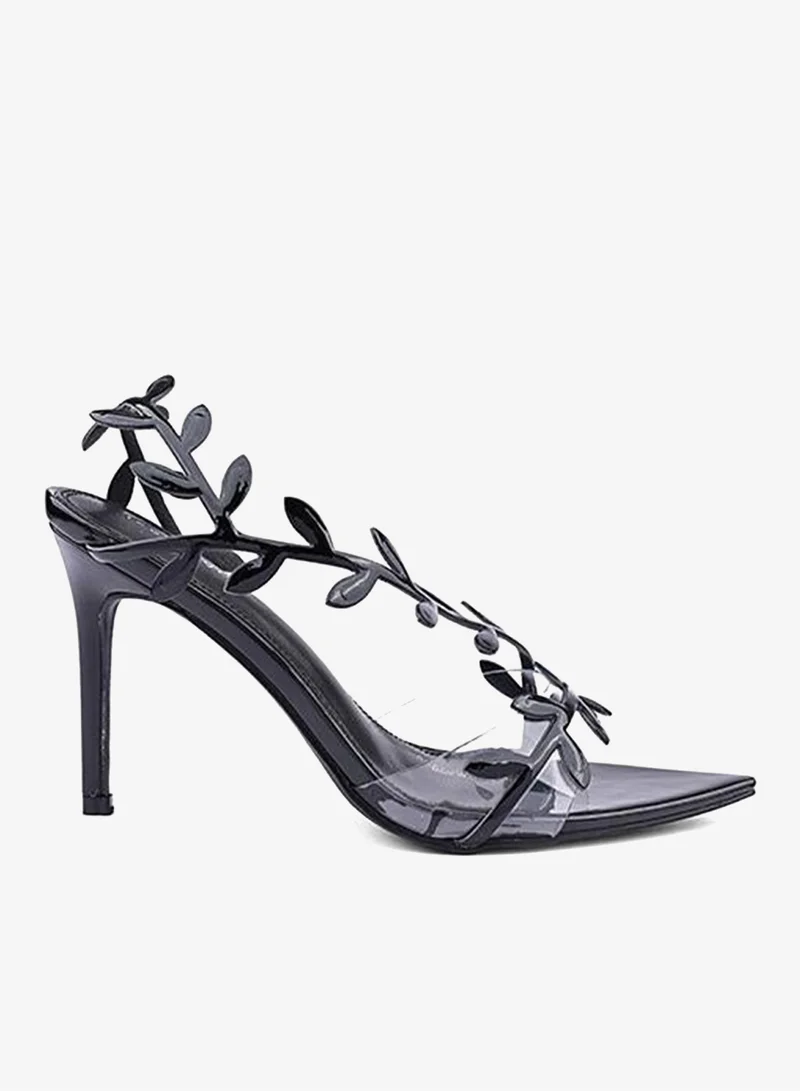 أيقون صنادل بكعب مزينة بأشرطة