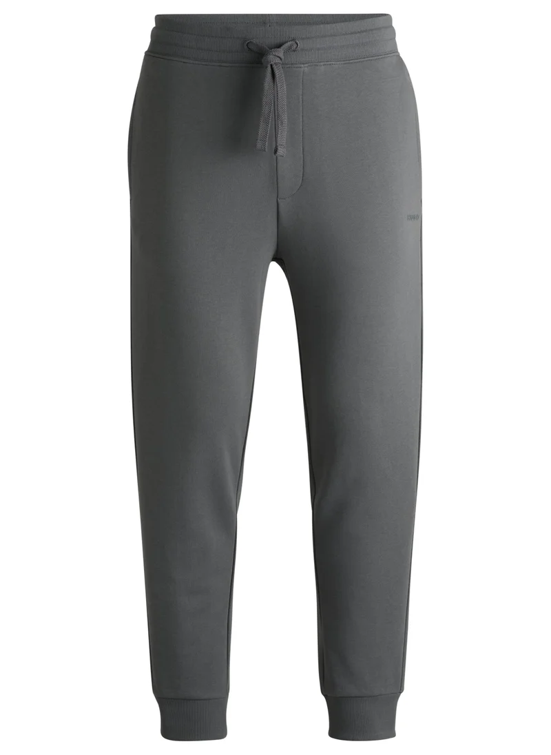 HUGO Cotton-terry tracksuit bottoms with logo print