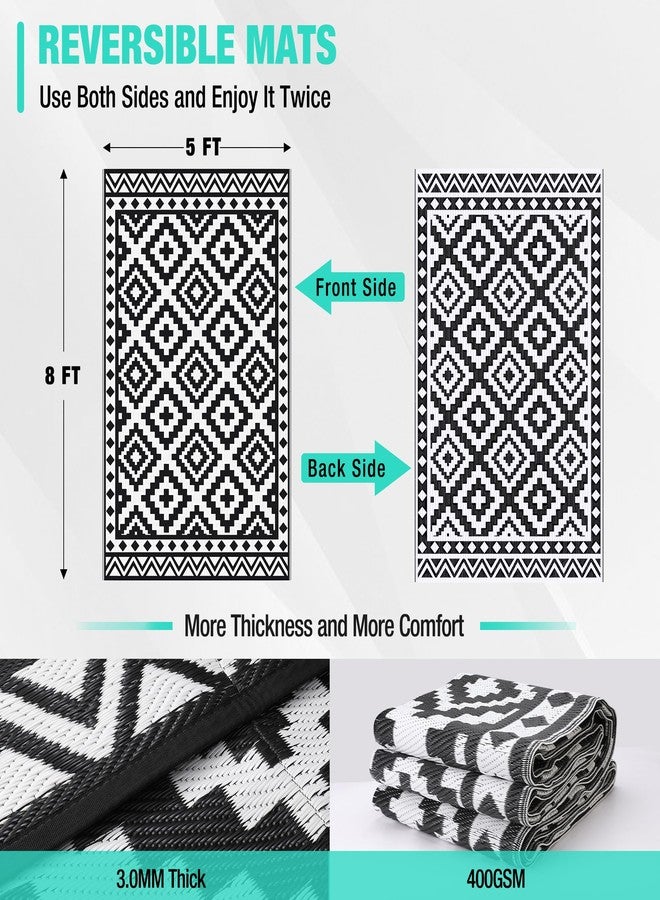HAUSHOF 5'X8' Outdoor Rug Waterproof, Thickened Outdoor Plastic Straw Rug, Reversible Patio Rug with 4 Rug Stakes, Outdoor Carpet Mat for RV Trip, Camping, Beach, Deck, Porch, Balcony, Black&White - Image 3