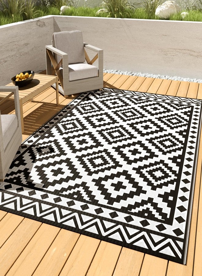 HAUSHOF 5'X8' Outdoor Rug Waterproof, Thickened Outdoor Plastic Straw Rug, Reversible Patio Rug with 4 Rug Stakes, Outdoor Carpet Mat for RV Trip, Camping, Beach, Deck, Porch, Balcony, Black&White - Image 1