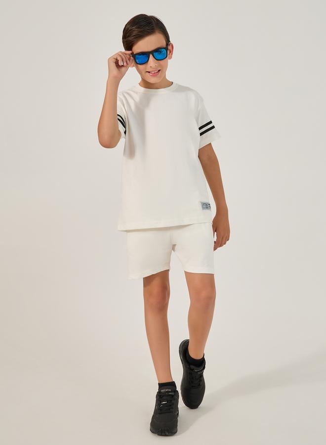 Styli Styli Striped Sleeve Trim Round Neck T-Shirt and Shorts Set  - Image 1