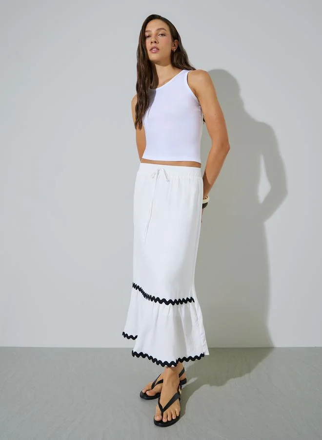 ستايلي White Solid Wavy Trim A-Line Midi Skirt