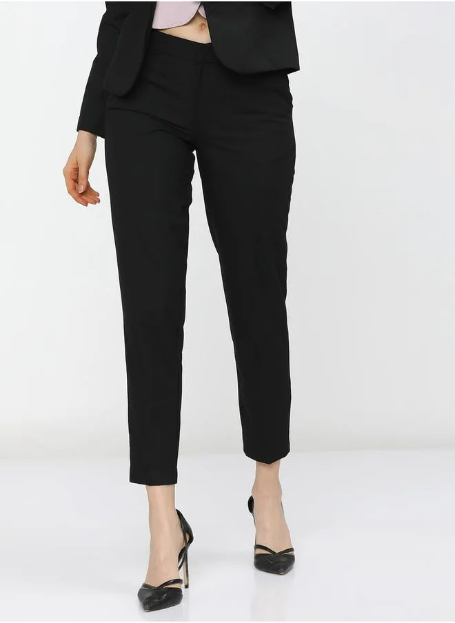 Tokyo Talkies Solid Mid Rise Crop Trousers by Styli