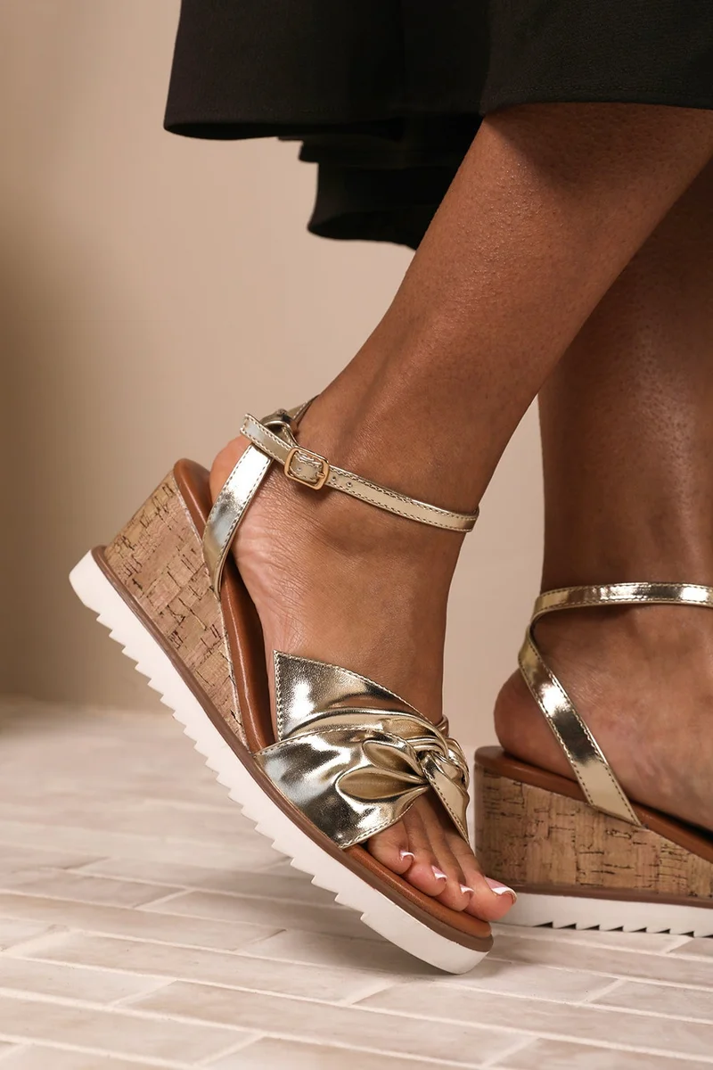 ويرز ذات فروم 'Qween' Knot Detail Wedge Shoes With Buckle Ankle Strap
