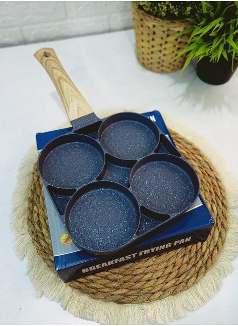 Granite frying pan 4 burners Granite pancake pan 4*1 The pan is ready to make eggs, pancakes, omelettes and qatayef. It makes sausages, hot dogs and breaded slices in one pan Heavy granite material