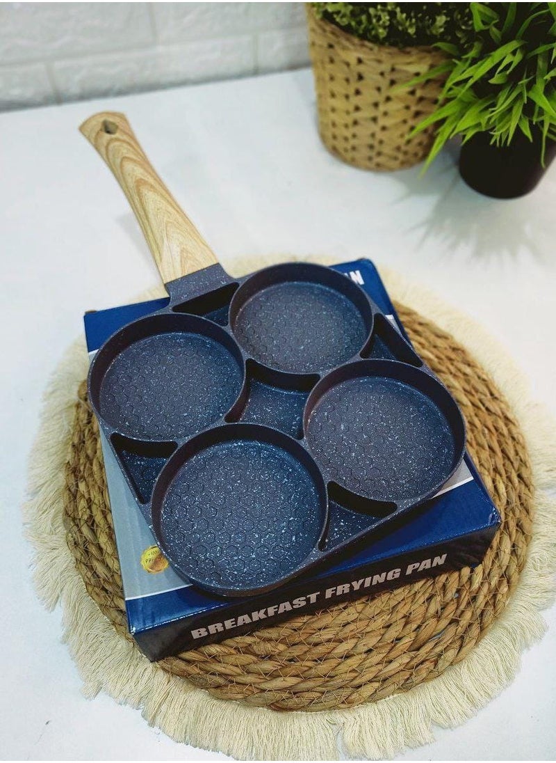 Generic Granite frying pan 4 burners Granite pancake pan 4*1 The pan is ready to make eggs, pancakes, omelettes and qatayef. It makes sausages, hot dogs and breaded slices in one pan Heavy granite material  - Image 1