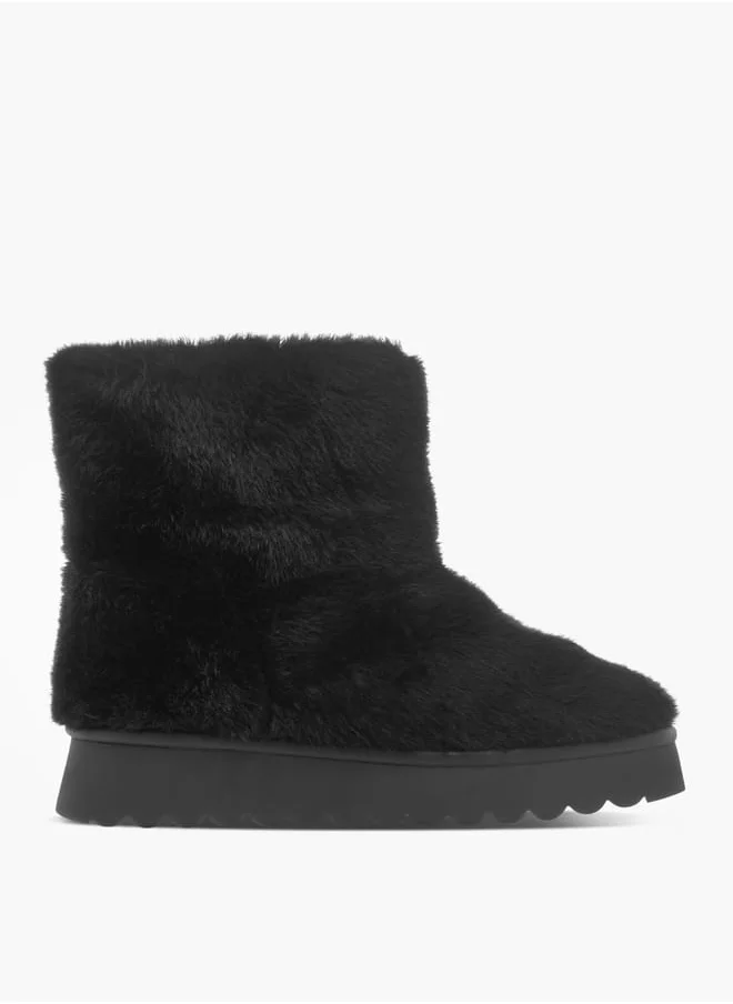 سيليست Womens Textured Slip-On Ankle Boots with Platform Heel