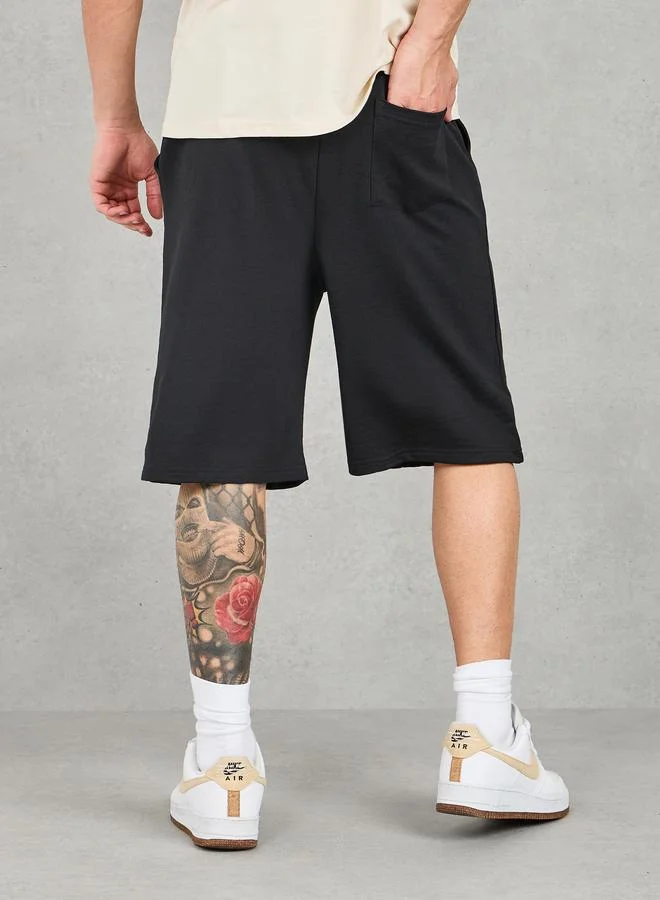 Styli Styli Oversized Solid Shorts with Drawstring